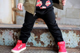 Whoever said you can't be stylish AND comfortable has never tried a pair of our City Comfort Toddler Joggers by Brooklyn + Fifth! We combined a comfortable sweatshirt fabric with cozy fleece lining and added stylish design features including a mock fly, a contrasting color back logo pocket and elastic cuffs to show off your sneakers! The result is the ultimate blend of style + comfort!  These pants have taken over the fashion industry and now you can own a pair for your stylish toddler as well!  